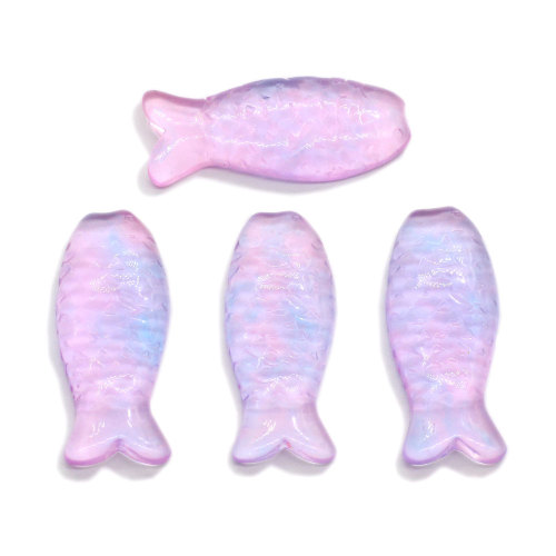 Nouveaux charmes 100 pièces / sac Mini poisson Transparent dos plat résine Cabochon pour téléphone fait à la main coquille perles charmes enfants jouet décor