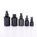 Slant shoulder matte black glass bottle with lid