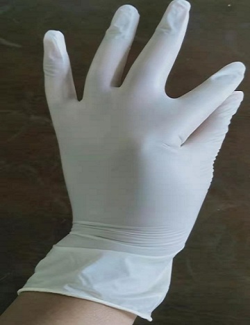 Yellow medical vinyl glove