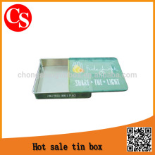 Tin box with slide lid