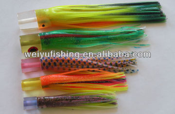 plastic trolling lure head with squid skirt in various sizes game fishing lure