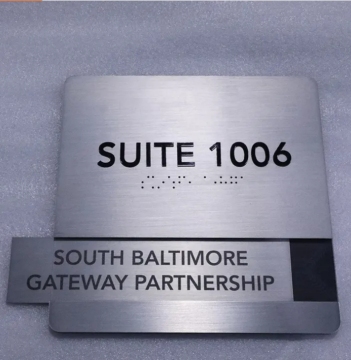 ADA signages with braille and raised lettering