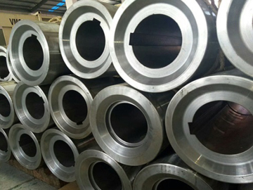 Cast bush and sleeve for sink rolls