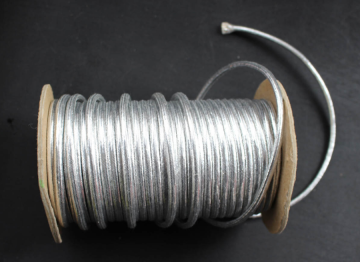 Shining silver metallic cord with roll