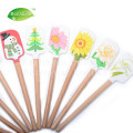 Spatule en silicone à motif de Noël avec manche en bois