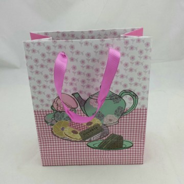 Fancy paper bag with ribbon closure