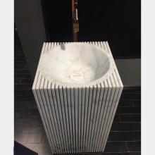 White marble pedestal bathroom sinks