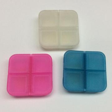 Plastic mini portable four-grid pill case