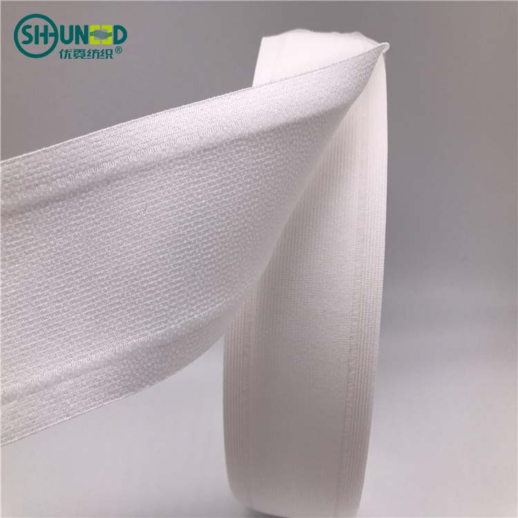 China wholesale hot sell 100% polyester stretch waist band interlining waistband high elastic adhesive dot fuse for Jeans pant