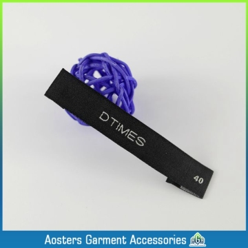 Recycled brand name apparel woven label