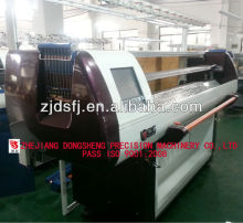 computerized flat bed knitting machine