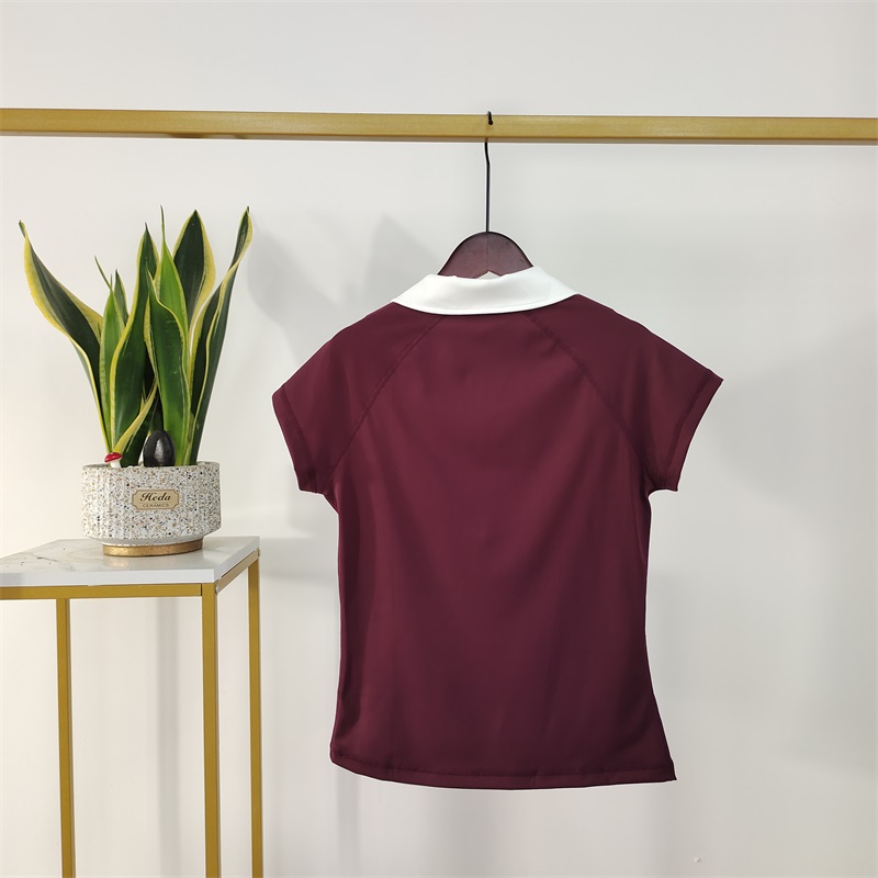 women riding shirt burgundy back