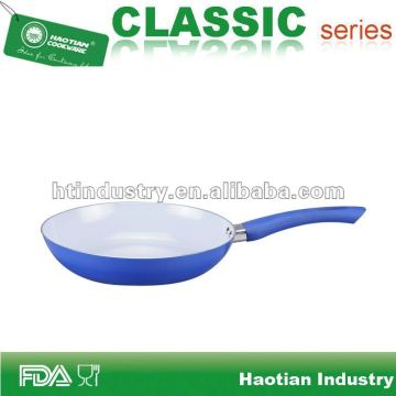 white ceramic fry pan