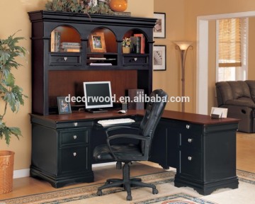 Black wooden bookshelf with computer table for home office