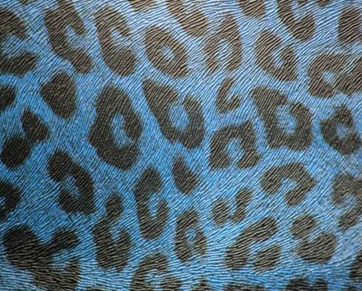 Couro em PU com padrão de mouse e leopardo em relevo Embossed mouse and leopard pattern PU leather
