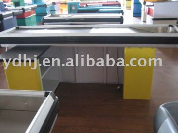 checkout counter with conveyor belt