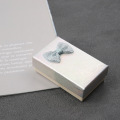 Benutzerdefinierte Luxus holographische Textur Papier mit Laser Silber Verpackung Schmuck Geschenkbox mit Band Großhandel
