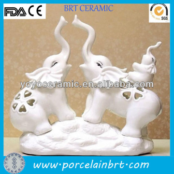 white hollow out ceramic elephants for wedding decorations