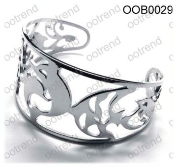 Woman Carved fish patern wild bangle made out of stainless steel ,custom patern bangle available