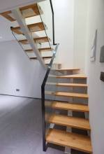 Double apartment U-shaped small straight-arched staircase