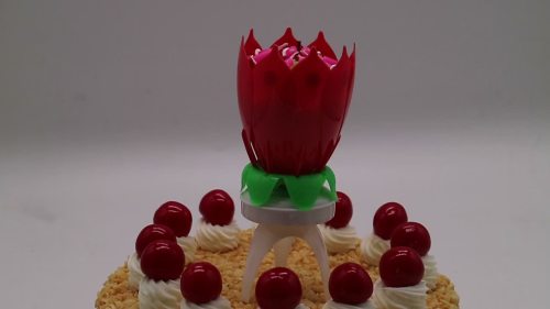 Vela de cumpleaños musical tipo trípode flor de loto