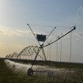 Spray wheel center pivot irrigation system