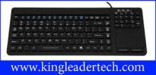 Waterproof slim silicone keyboard with integrated touchpad