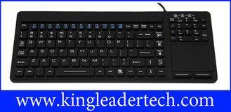 Waterproof slim silicone keyboard with integrated touchpad