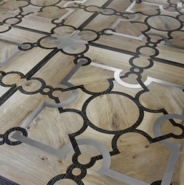 Antique and custom-made wooden floors with metal inlay