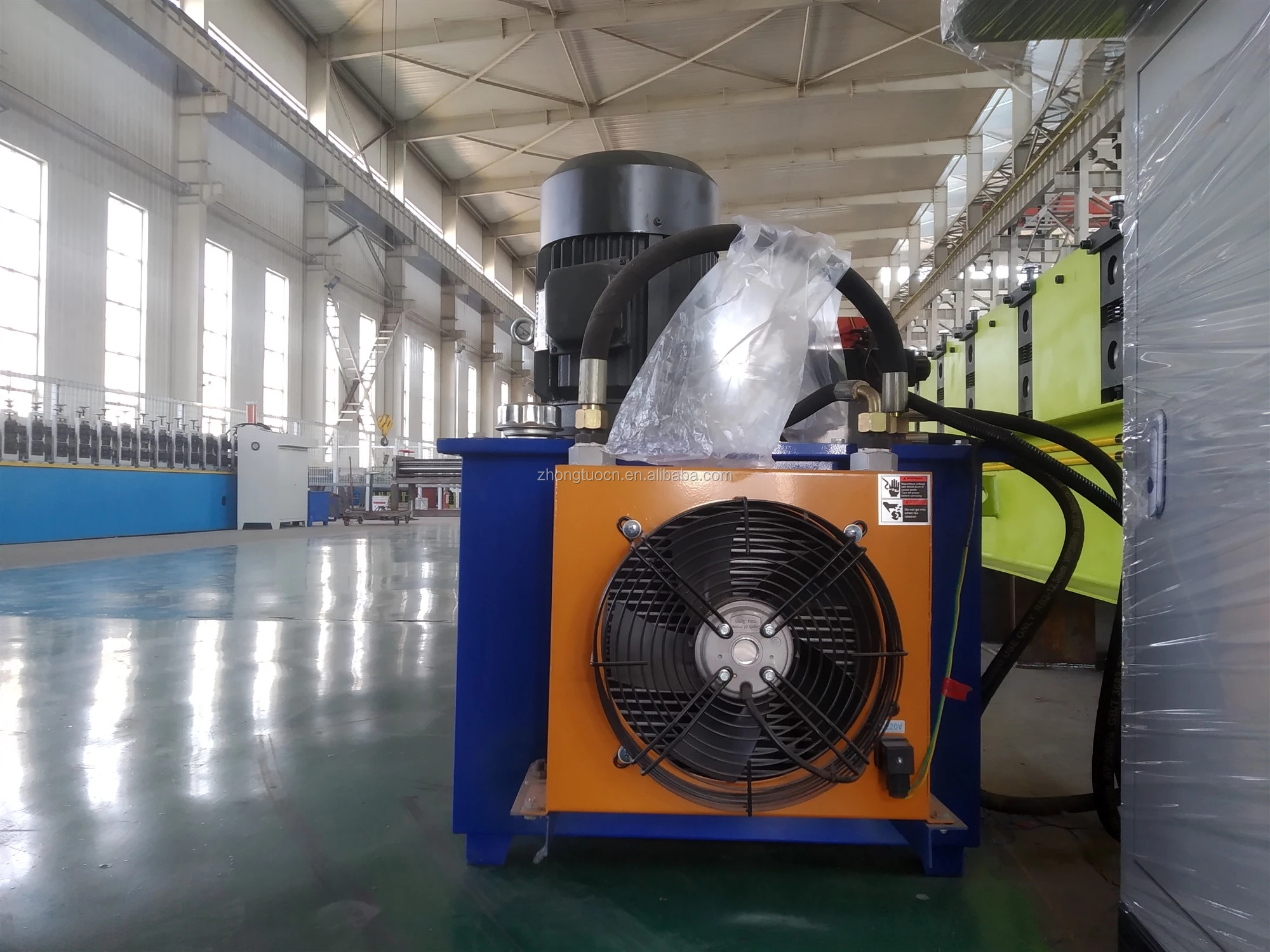 Corrugated iron sheet making machine