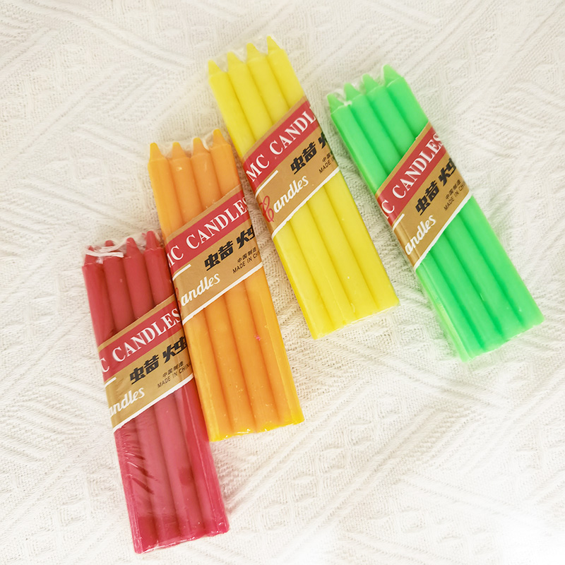 Свечка з загаворамі розных колераў. Маленькая канічная свечка для курантаў