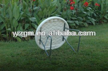 white plastic folding round table