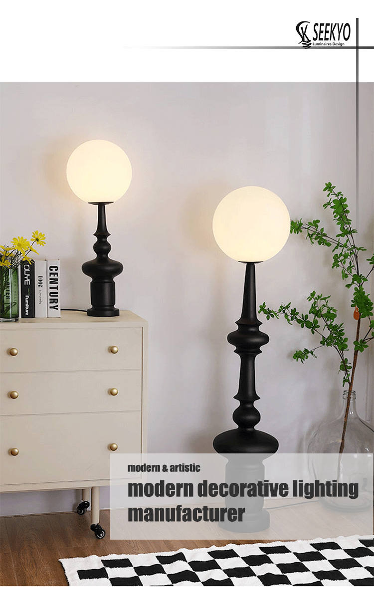 Wabi-sabi style black resin floor lamp is a minimalist and rustic lighting fixture Wabi-sabi style black resin floor lamp is a minimalist and rustic lighting fixture