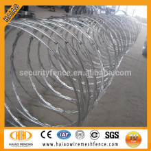 installing barbed wire fence