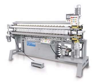Automatic spring assembling machine