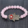 Pulsera de piedras preciosas elástica de cuentas redondas de cuarzo rosa de 8 mm con pieza de mal de ojo de diamante