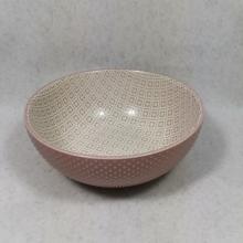 Embossed stoneware mugs and bowls