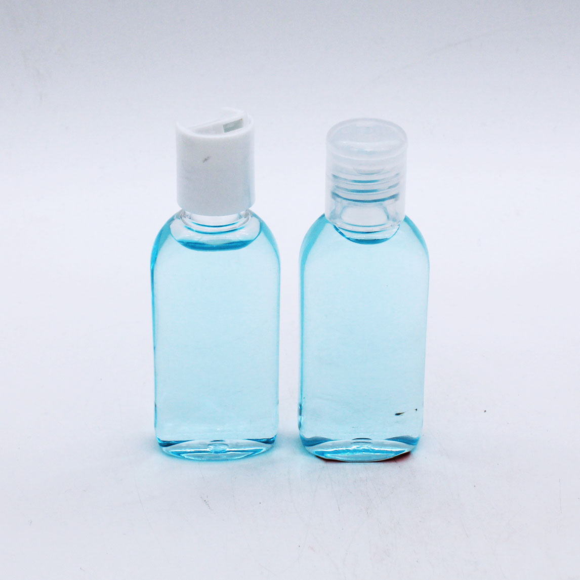 custom portable leakproof 50ml clear pet plastic empty sanitizer bottle with screw cap