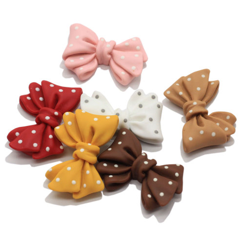 27MM Polka Dot Bow Resina Decoración Artesanía Flatback Cabochon Scrapbooking Adornos DIY Bowknot Hair Horquilla Accesorios