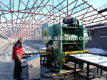 Perforated plasterboard making machine