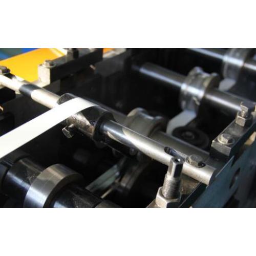 Tee grid roll forming machine