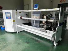 Single shaft automatic adhesive tape cutting machine