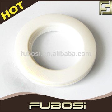 White plastic curtain rings for clear curtain rods