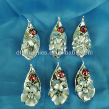 porcelain silver flower with ladybird