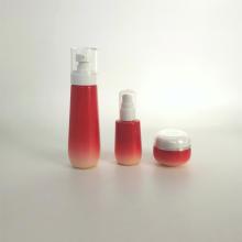 Conjunto de botella de vidrio cosmético degradado rojo