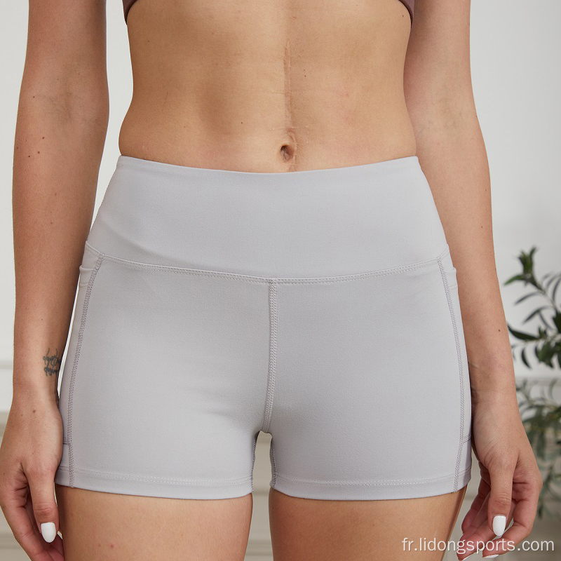 Couvrage des femmes pantalons courts de fitness pour femmes