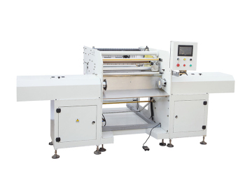 Rewinding machine for stretchable material