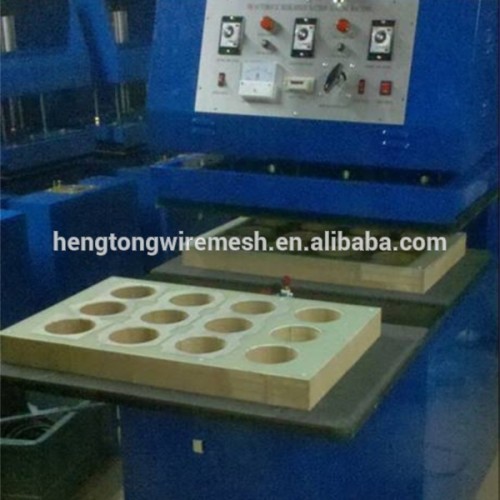 Automatic plastic blister and paper card packing machine