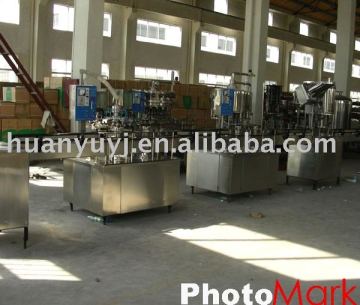 Linear washing, filling and capping machine for bottled water