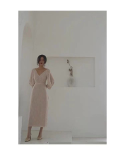 A creased beige dress in autumn style